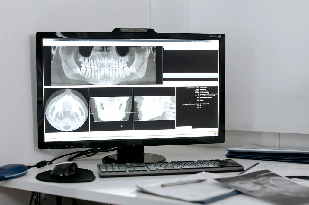 Team of computer specialists working with advanced diagnostic systems